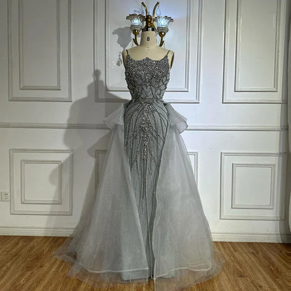 Luxury Dubai Nude Saudi Beaded Spaghetti Strap Evening Dress with Overskirt LA72810