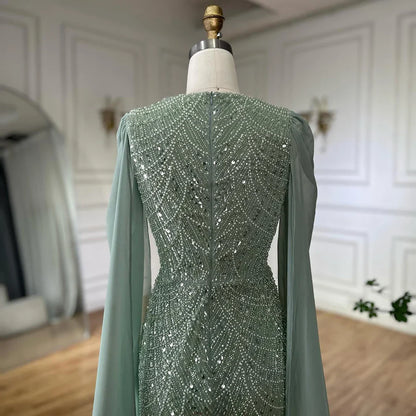 Luxury Blue Mermaid Evening Dress with Cape Sleeves Beaded Gown LA72160A