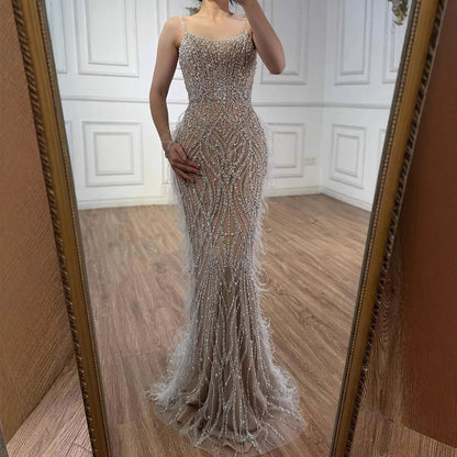 Luxury White Nude Spaghetti Strap Feathers Beaded Mermaid Dress LA72823